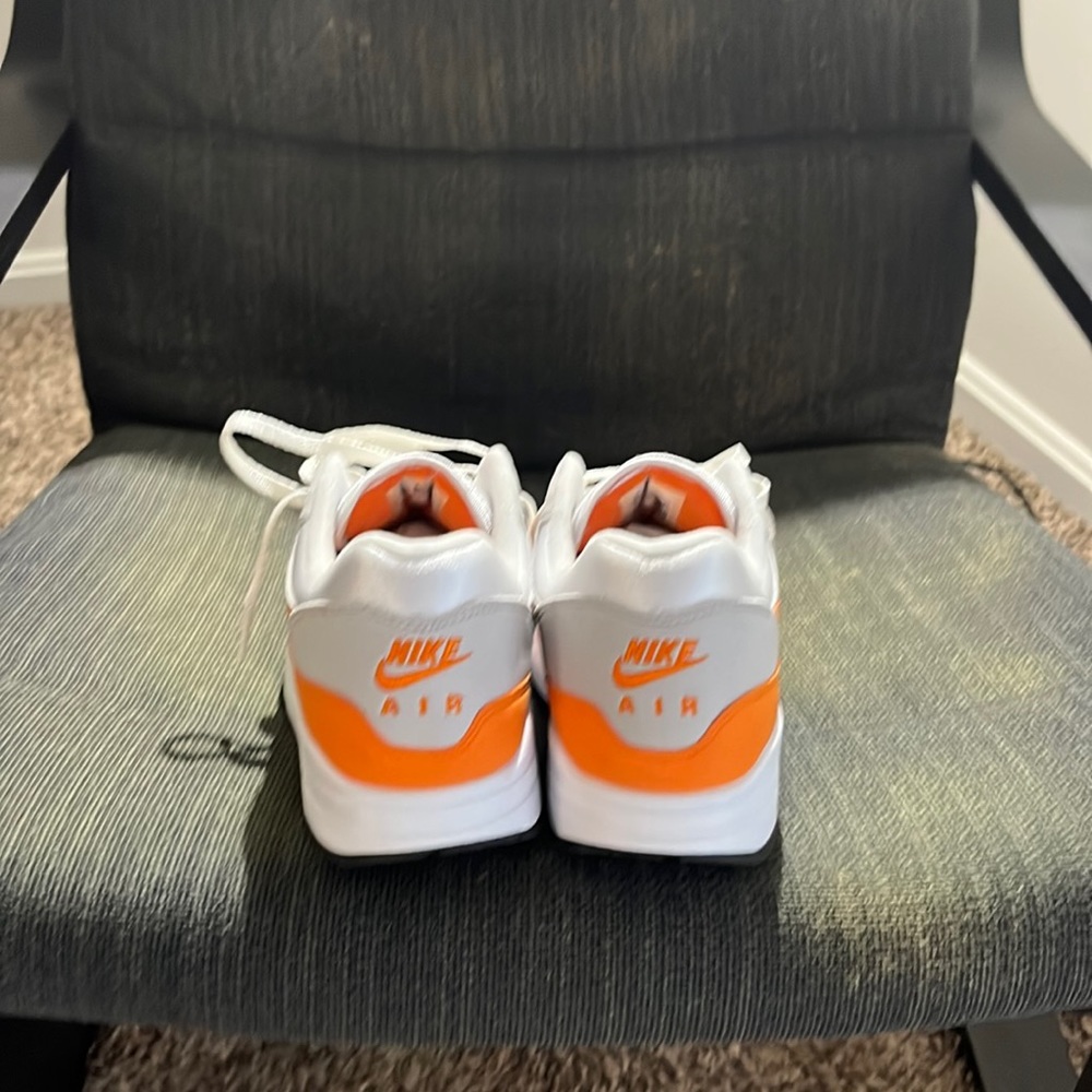 A pair of 10.5 Nike Air Max 1. Worn once or twice briefly. Excellent condition.